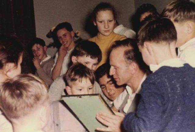 Colonia Dignidad_Sect leader Paul Schäfer with a group of children in Heide, Germany, approx. 1960 © LOOKSfilm